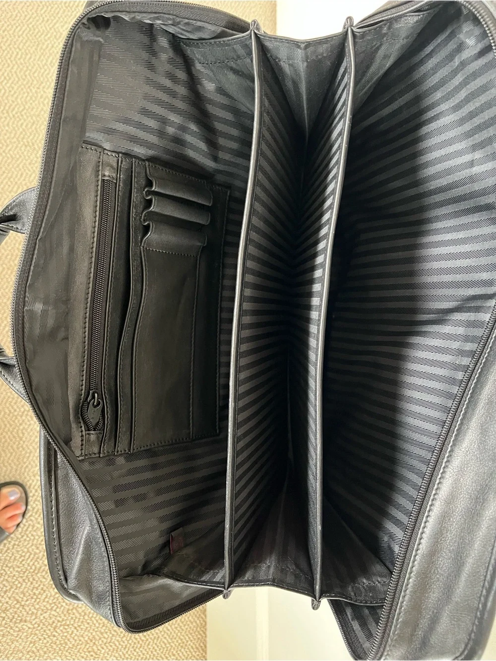 Tumi sleek leather